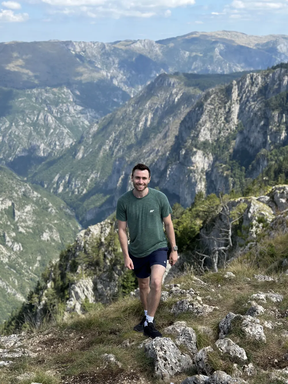 Stephen hiking in the Balkans, the travel blogger behind Facts & Footsteps, a Bolivia travel blog with tips and trivia