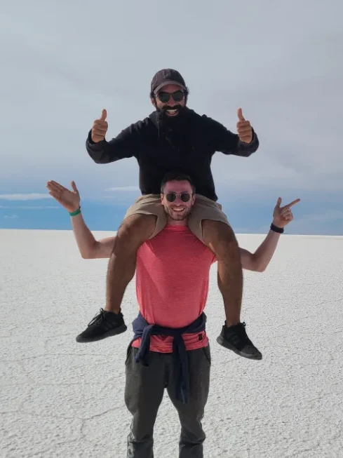 Bolivian Salt Flats Man on Facts and Footsteps Shoulders