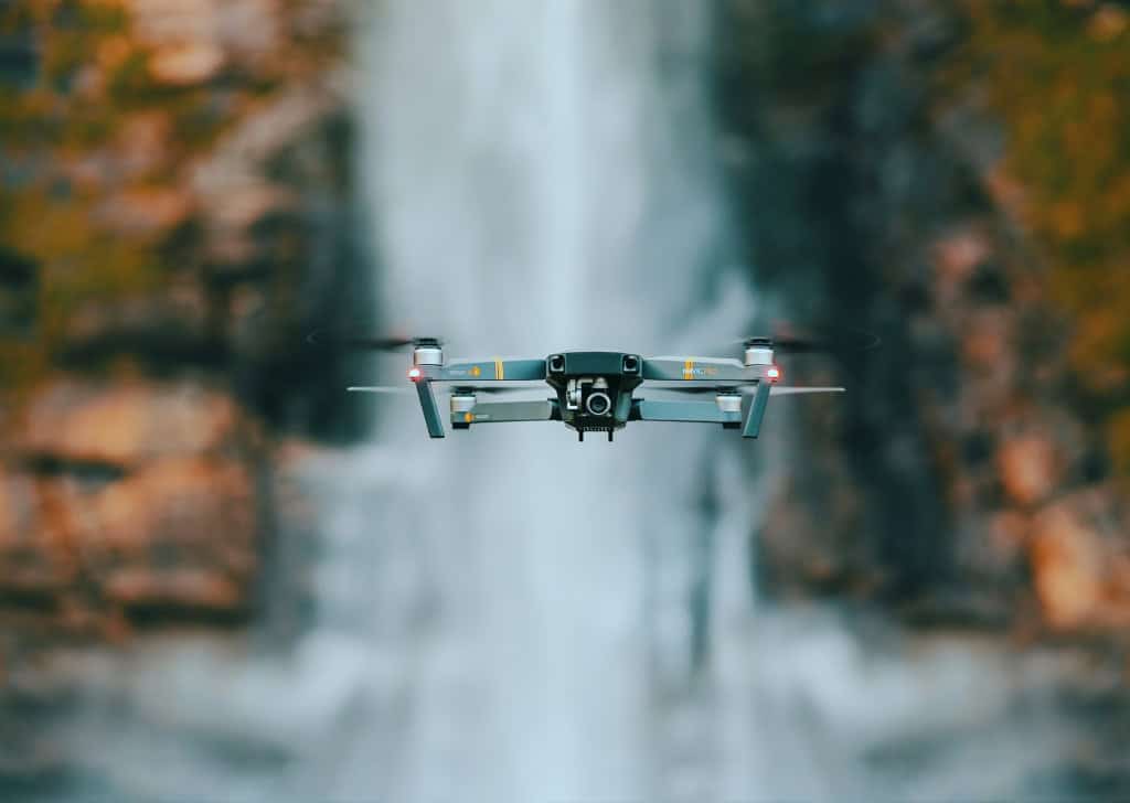 Close-up of drone flying in front of a waterfall in Bolivia