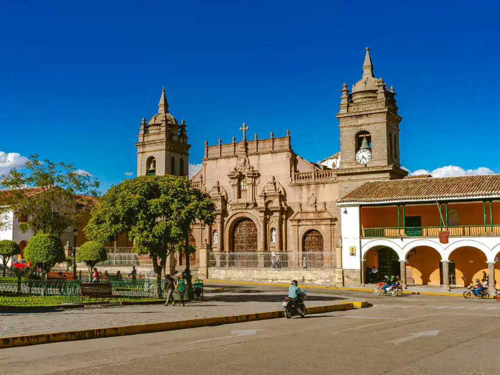 San Felipe Neri Church and colonial buildings overlooking a historic square in Sucre, Bolivia.