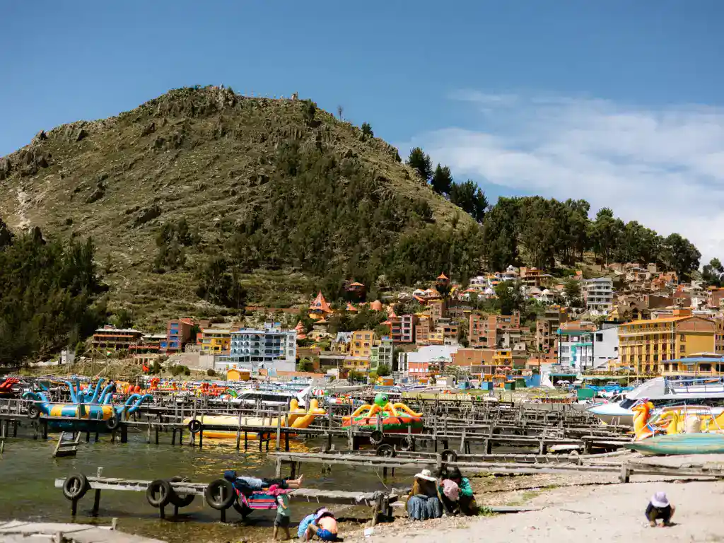 Marina filled with boats beside the charming town overlooking Bolivia's famous alpine lake.